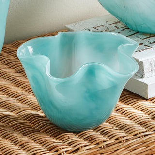 A modern update to the open glass form, the mouth blown organic bowl is made with pot color, not sprayed. A soft light blue watercolor-inspired look.
Dimensions: 7.5 x 7.5 x 5
Material: Glass, Color: Light Blue, Care & Use: Interior use. Handwash glass. Avoid detergents or chemicals that might be harmful to finish.
Third & Main, Home Decor, Spring Decor, Decor, Everyday Decor, Glass, Blue, Handmade, 