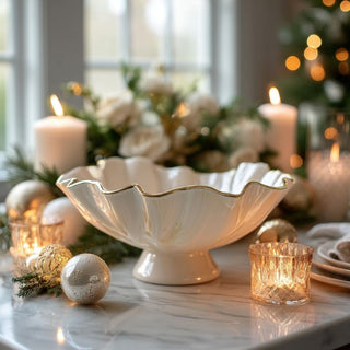 Cream enamel bowl with gold trim inspired by floral bloom design — elegant food-safe holiday décor and serveware by Third & Main.