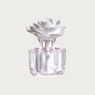 This diffuser design features a lovely crystal shaped body with a subtle hint of color and white porcelain flower top to diffuse the aromas. TOP NOTES: Lily of the Valley, Fresh Aldehydes 
MIDDLE NOTES: Bergamot, Rose Petals, 
BASE NOTES: Musk, Mallow, Amber
Third & Main, Home Decor, Luxury Scents, Luxury Living, Luxury Decor, Luxury Homes