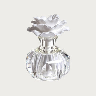 This design features a lovely crystal shaped body with a subtle hint of color and white porcelain flower top to diffuse the aromas. ;Isabella Diffuser Fragrance Notes:
TOP NOTES: Aquatic Notes, Eucalyptus, Anise Seed 
MIDDLE NOTES: Amber, Driftwood 
BASE NOTES: Cedar, Sea Moss, Musk
Third & Main, Home Decor, Luxury Scents