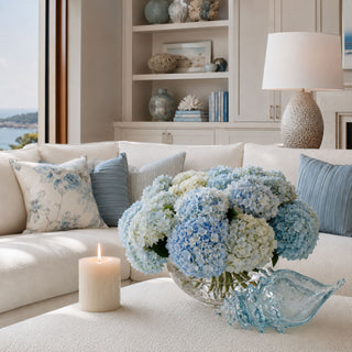 Third & Main 11 inch Aqua Lagoon Glass Seashell style in a luxury coastal home with a floral bouquet of hydrangeas