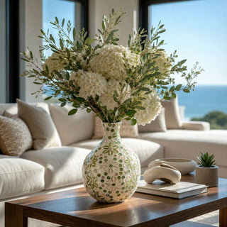 Luxury Caprais Pear Garden Vase Styled with Hydrangeas and olive branches, in a luxury coastal california styled home