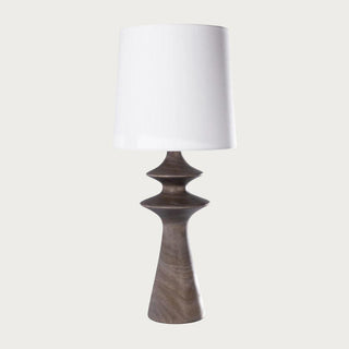 Neutral tabletop lamp with sculptural paulownia wood base and white cotton shade, featuring a light, airy design perfect for elevated quiet luxury home interiors.