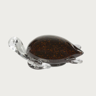 hand blown glass tortoise sculpture with amber shell and clear glass details for coastal bookshelf and coffee table styling