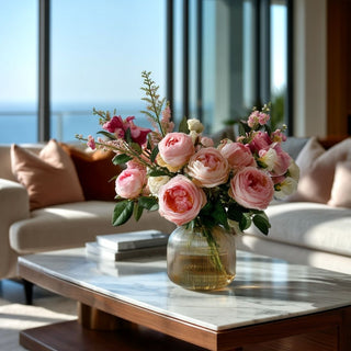 True Bloom pink real touch Austin rose floral arrangement in ribbed glass vase styled on marble coffee table in luxury coastal California modern contemporary living room with ocean view and neutral linen sofa