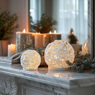 White scrolled snowflake LED water globes with swirling glitter effect — elegant holiday décor set available in large and small sizes by Third & Main.