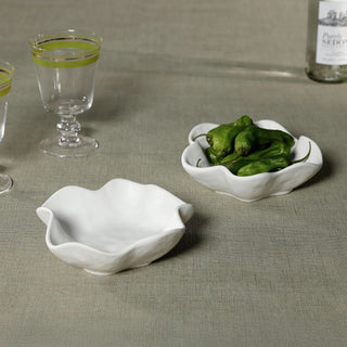 white wavy ceramic condiment bowl with organic edges styled for charcuterie entertaining and kitchen serving