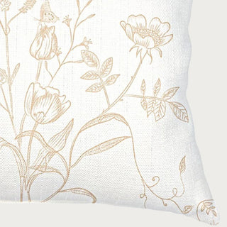 Beige English Garden linen throw pillow with tan botanical print styled on a sofa, Third & Main