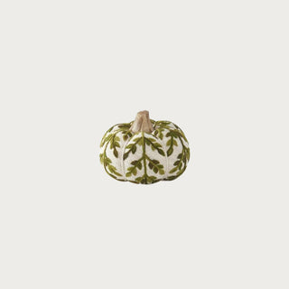 3.5-inch cream knit pumpkin with olive green foliage pattern and natural mango wood stem for small fall decor displays.