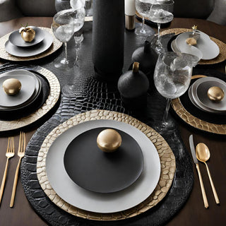 Black side of the faux croc reversible round placemat
