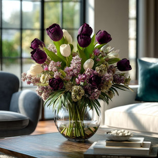 Deep plum True Bloom Real Touch Tulip 6 stem bundle styled in a glass vase on a modern coffee table, Third & Main