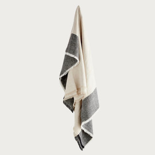 European linen throw blanket in flax and charcoal, folded view