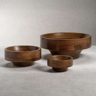 Handcrafted large dark brown mango wood bowl, close detail of wood grain