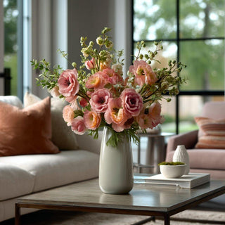Lifelike real touch faux floral arrangement with soft blush pink blooms and greenery in a ceramic vase, styled by Third & Main to demonstrate how to choose realistic faux florals for home decor.