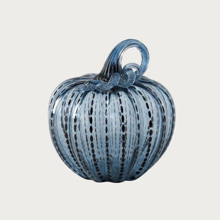 Large blue speckled handblown glass pumpkin measuring 7.5 inches high by 7.75 inches wide with ribbed glass and a looping blue glass stem.