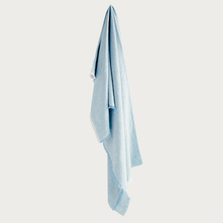 Light blue European linen throw blanket, folded view