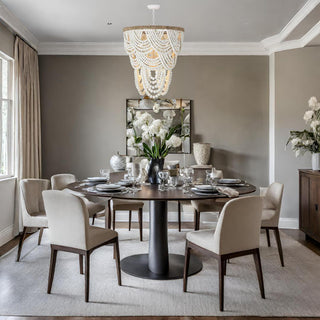 Lorelei wood bead chandelier styled hanging over a dining room table