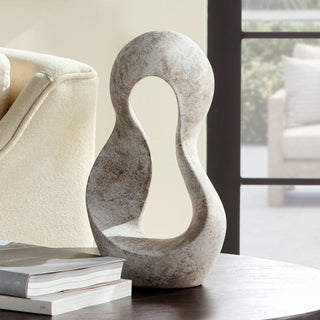 Lyra Sculpture in Natural Gray styled on a bookshelf, matte clay art object, Third & Main