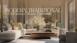 Modern traditional living room featuring a tailored neutral sectional sofa, classic accent pillows, a wood coffee table with stacked books, soft floral arrangement, and an elegant interior that blends timeless design with modern refinement