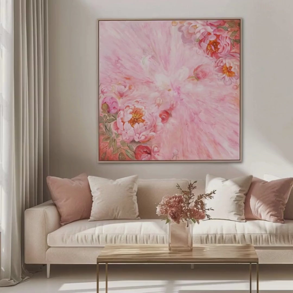 Short display video of Kate Tova “Peony Power” 39x39 contemporary floral wall art styled above a neutral sofa in a luxury Miami living room with soft pink peony artwork, modern brass coffee table, and natural light.
