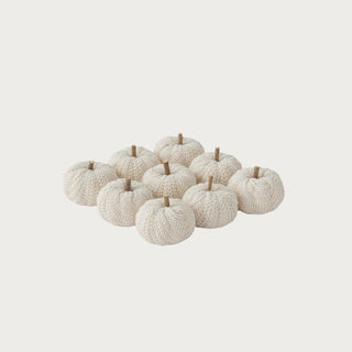 Cream knit filler pumpkins shown grouped for styling inspiration; each petite pumpkin is sold individually for fall bowls, trays, baskets, and centerpieces.