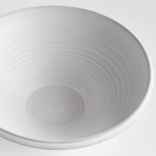 The Mirela hand-thrown terracotta bowl, side angle view