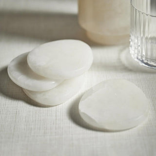 White alabaster coasters, stacked view showing natural veining
