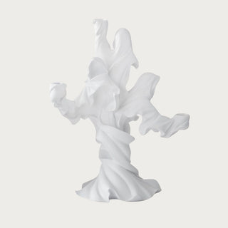 Alternate view of the white resin three-taper ghost candle holder showing flowing sculpted fabric, layered ghost forms, and three candle openings for Halloween styling.